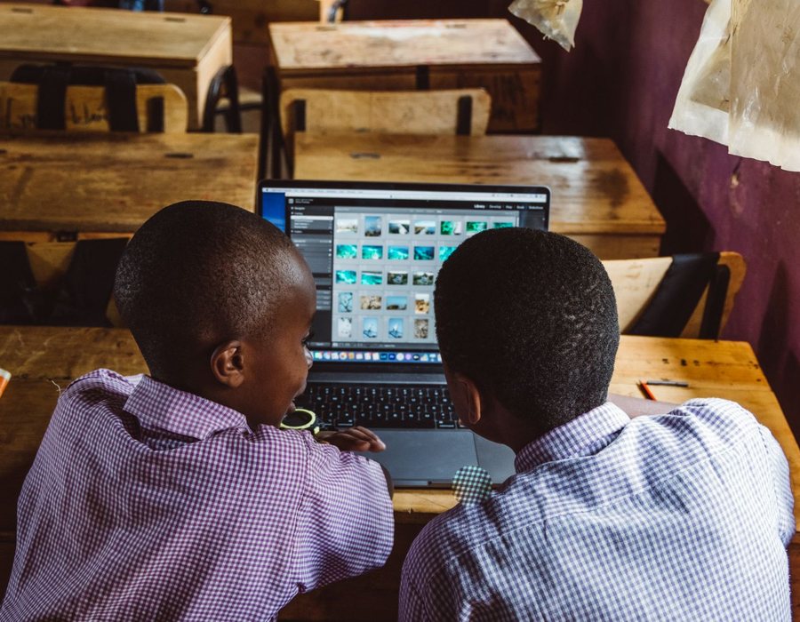 Nigerian students on a laptop with the Samdos Student App