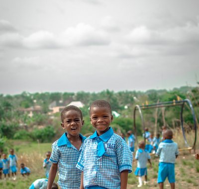 Pupils in blue uniforms in Ishiagu, Nigeria